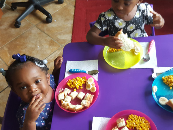 Eating Healthy Snacks at Lanas Learning Pad Daycare in Edgewood Maryland
